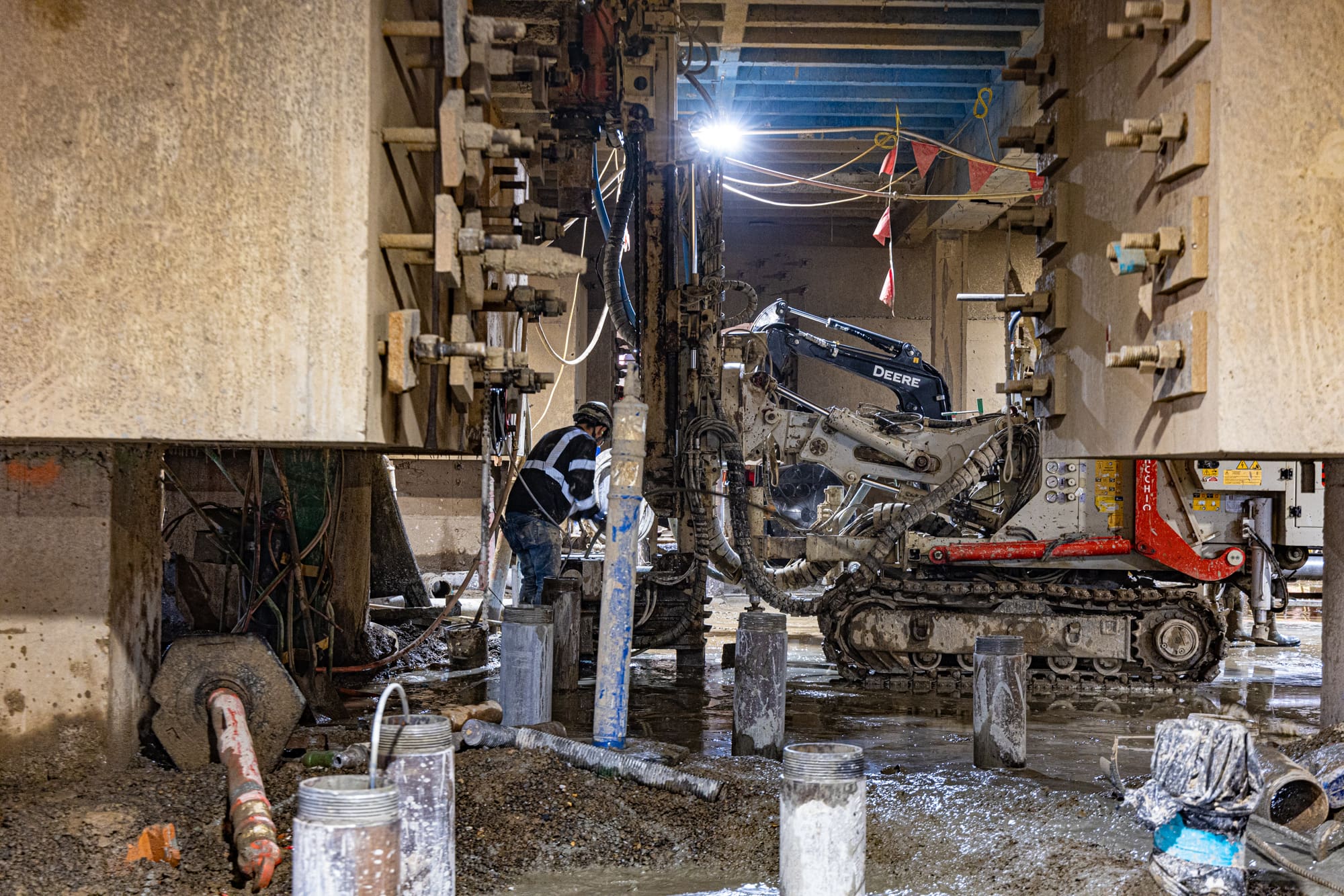 A man prepares a Commacchio MC-4 rig for micropiles at the Oregon State Capitol