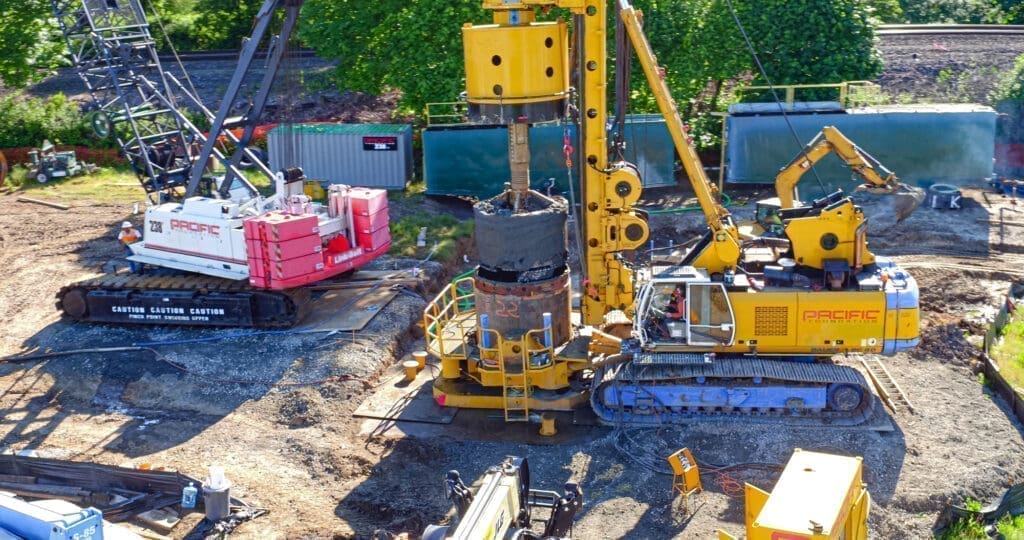 A Bauer BG40 and Liebherr Casing Oscillator install very large diameter drilled shafts and casing at the Pioneer St Rail Overpass in Ridgefield, WA