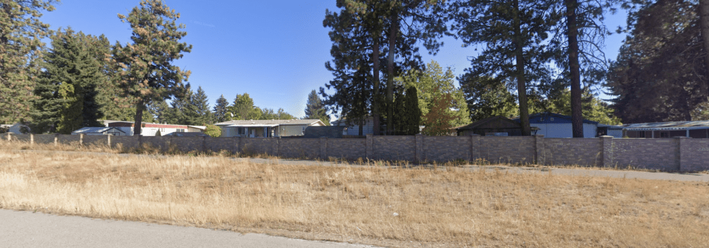 a Sound Wall protects a residential area from traffic noise in Hayden, ID