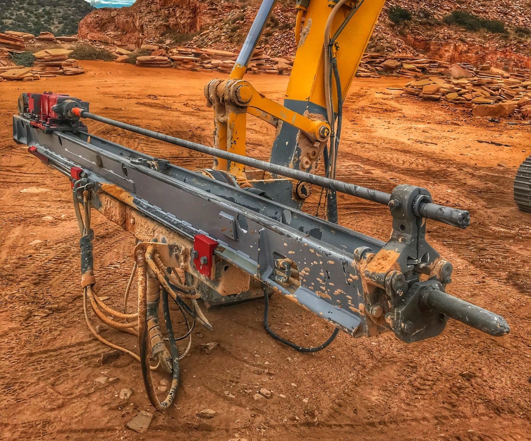 TEI HEM excavator drill attachment