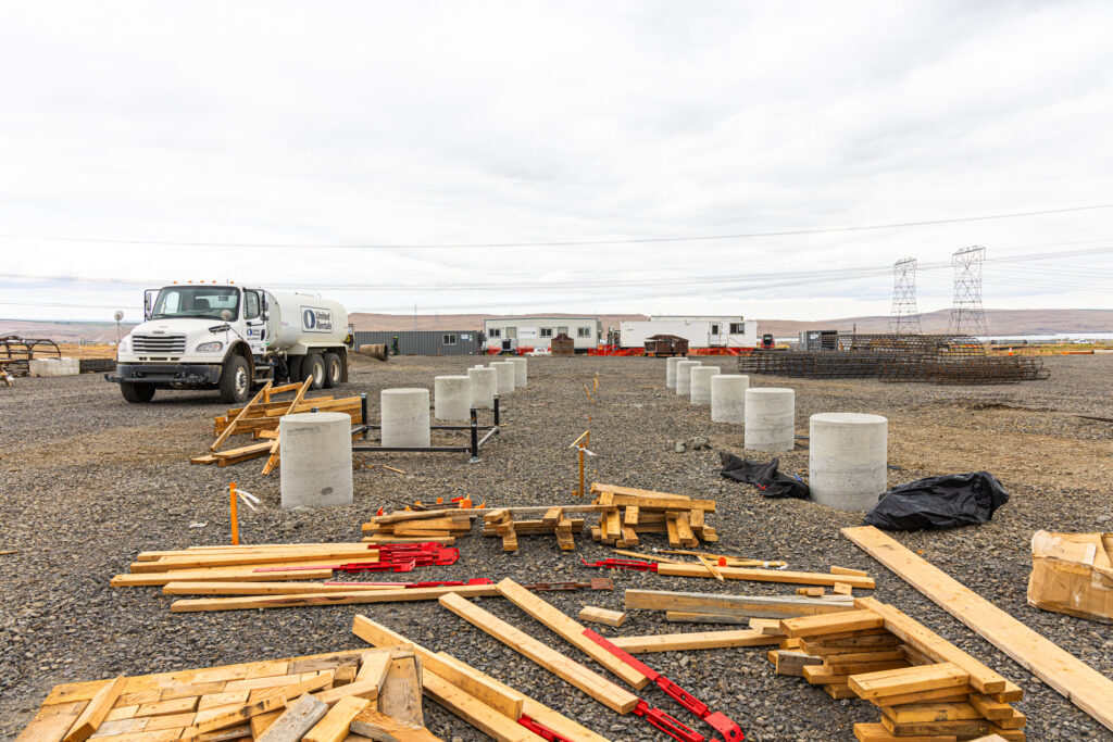 Completed drilled shaft tops aligned across the Tower Solar site.